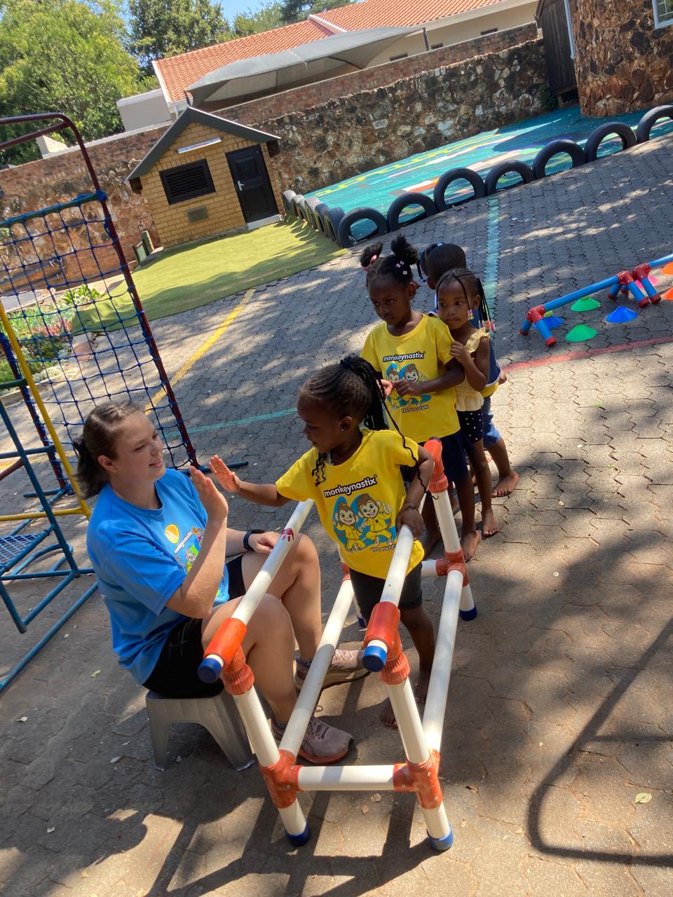 Teacher smiling in classroom